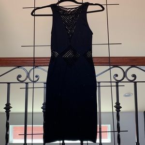 Sexy form fitting little black dress mesh detail